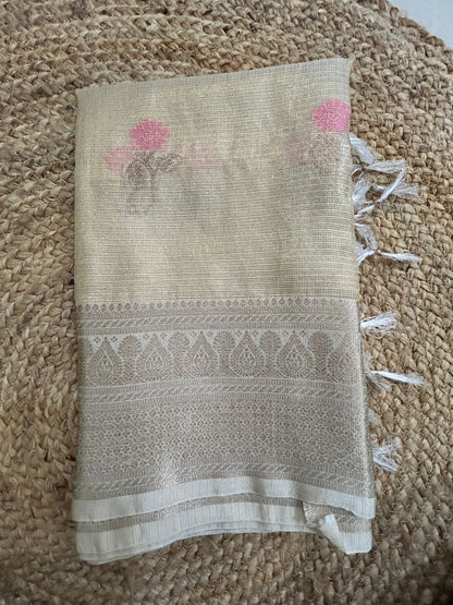 Tissue silk in golden with floral motifs saree