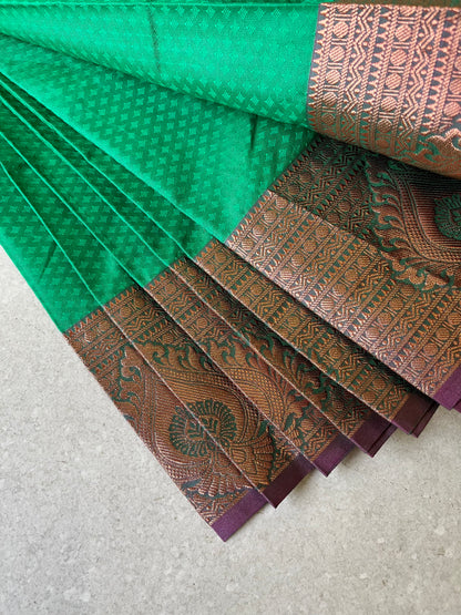 Semi silk brocade green saree