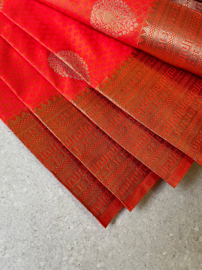 Semi silk brocade orange butta saree