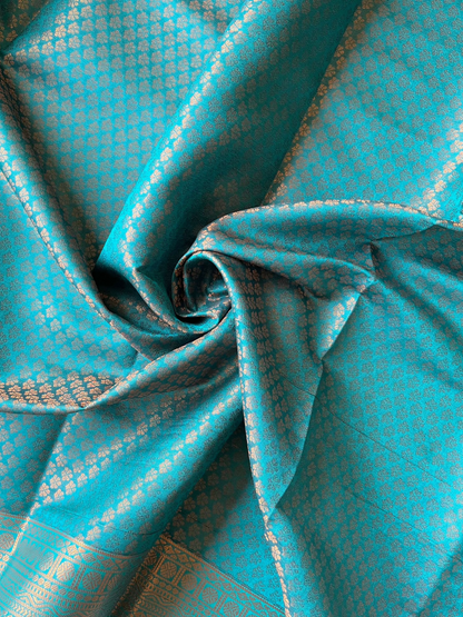 kanchi silk brocade cream blue border saree