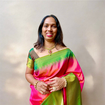 Semi silk peach with green border saree