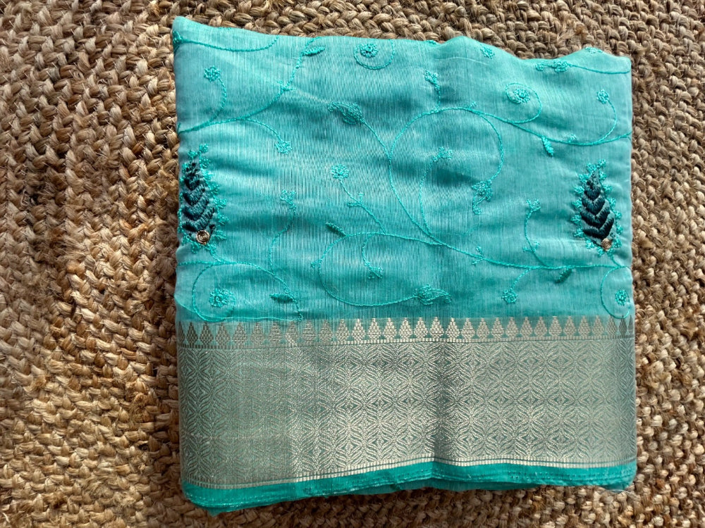 Cotton mix thread embroidered green saree