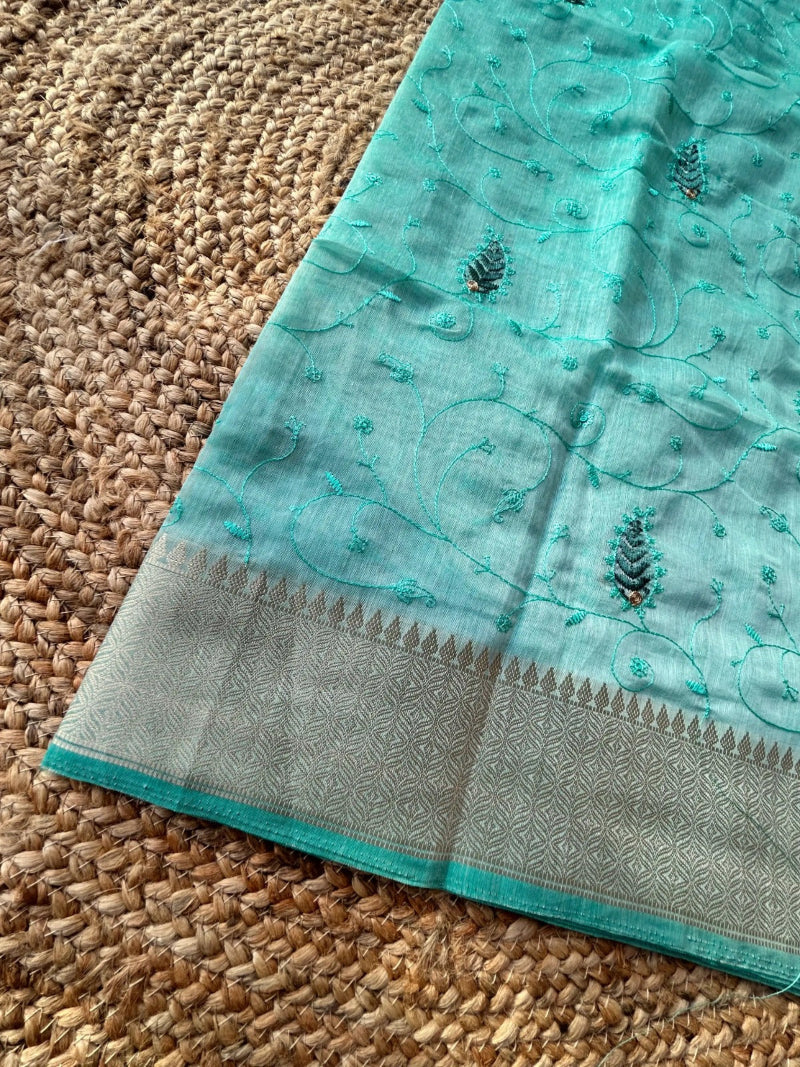 Cotton mix thread embroidered green saree