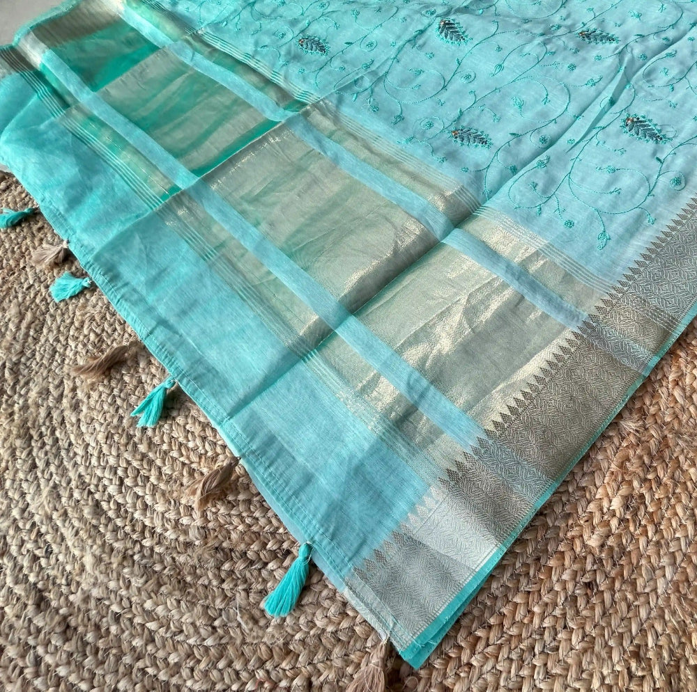 Cotton mix thread embroidered green saree